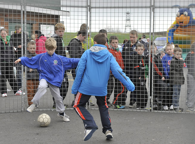 Budding young footballers get the opportunity to test their skills in the Nomad Football Cage at the last Glentoran Family Festival at the Oval on Saturday 25 February 2012